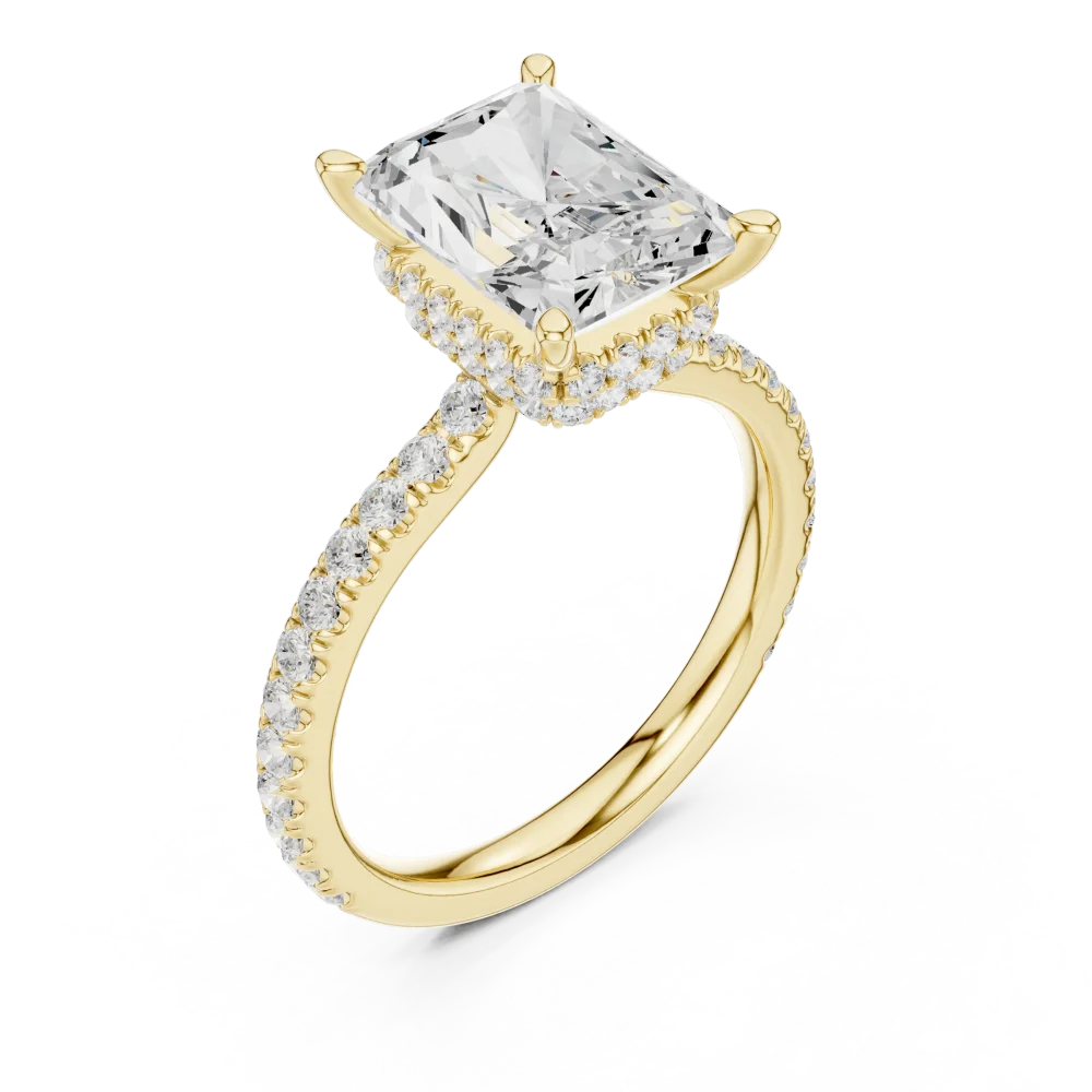 Experience the brilliance of our radiant-cut DIAMEUR solitaire ring, featuring a hidden halo and pavé band. Shop this modern luxury classic today.