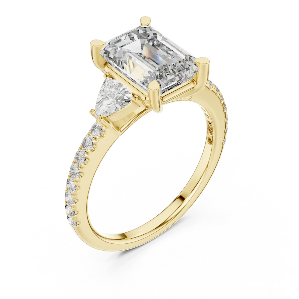 Discover the modern elegance of our three-stone emerald cut engagement ring, featuring shimmering DIAMEUR diamonds. Shop this sustainable luxury today.