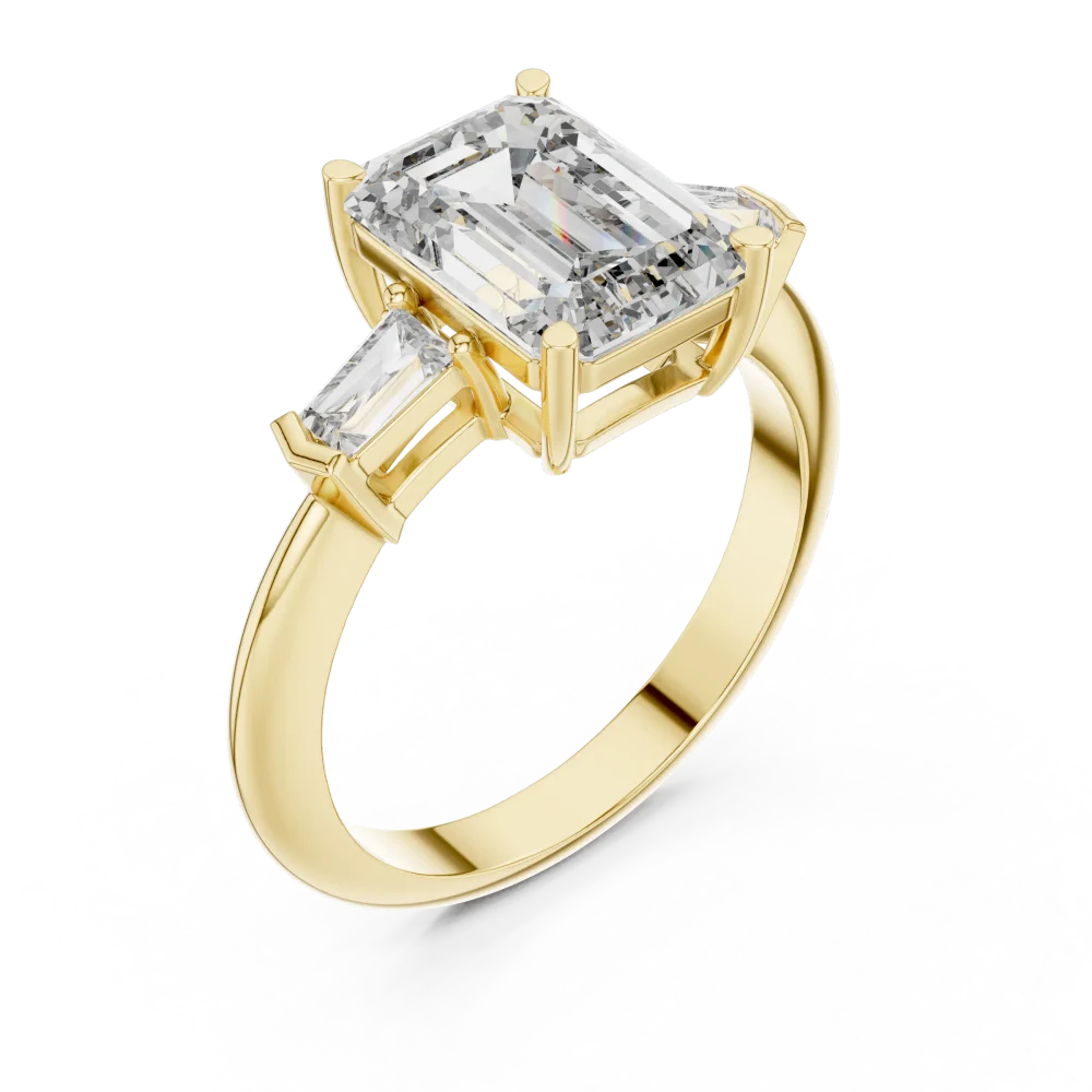 Discover the Symmetry Emerald and Baguette Ring, featuring a stunning center DIAMEUR diamond. A modern classic for everyday luxury. Shop now.