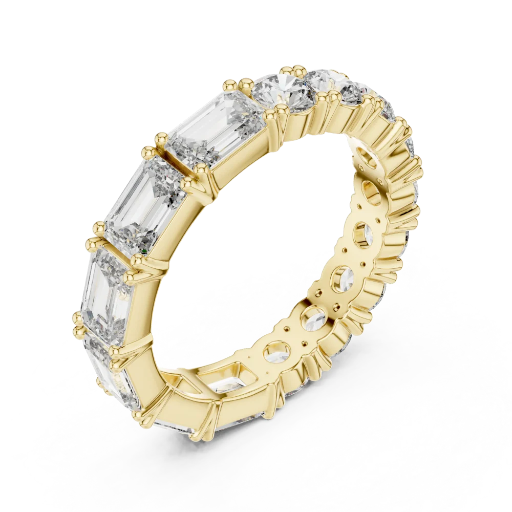 Discover the brilliance of our alternating emerald and round DIAMEUR diamond band. A modern classic design crafted for timeless elegance. Shop now.