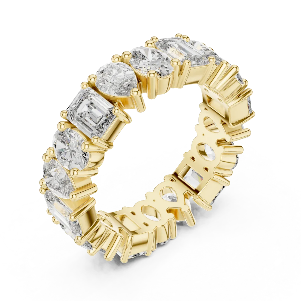 Discover the Infinite Radiance band, a symphony of emerald, pear, and oval DIAMEUR diamonds crafted for timeless luxury. Elevate your style today.