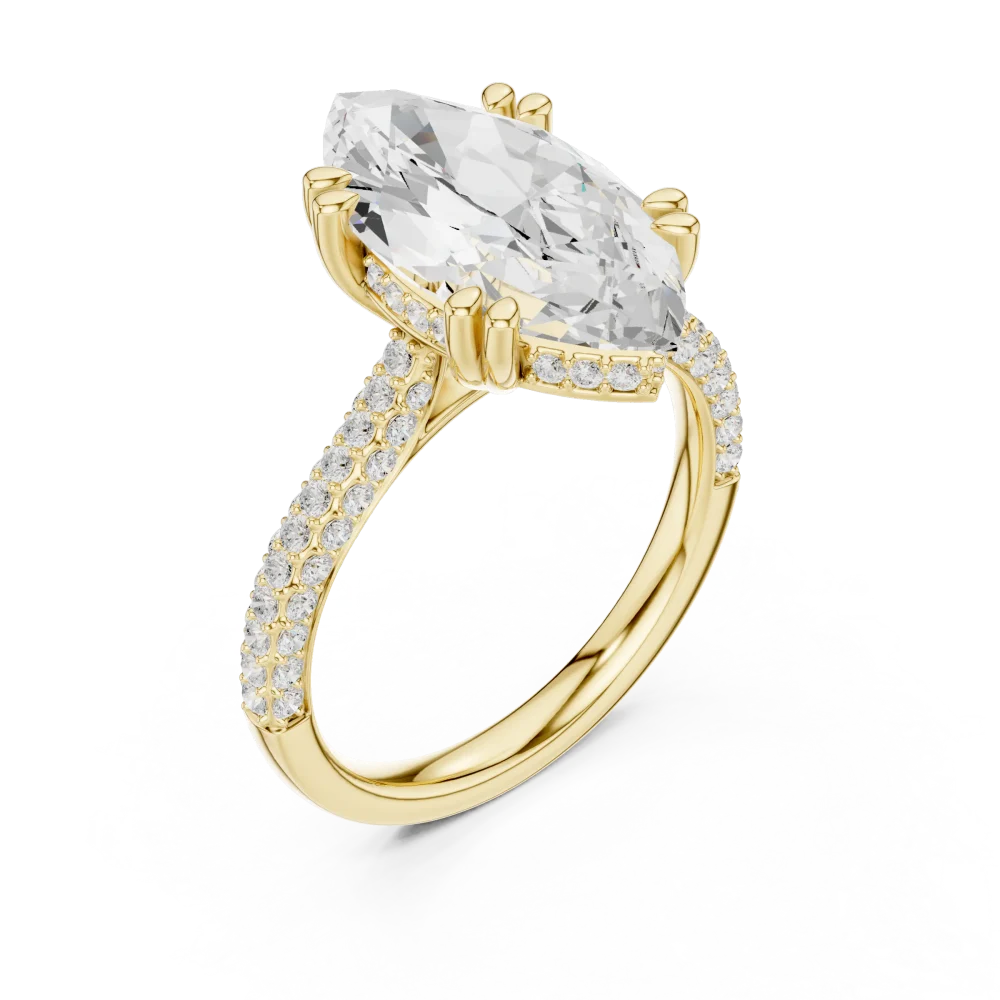 Discover the Ethereal Marquise Solitaire, a brilliant-cut masterpiece featuring a center DIAMEUR diamond and intricate pavé. Shop this modern luxury ring.