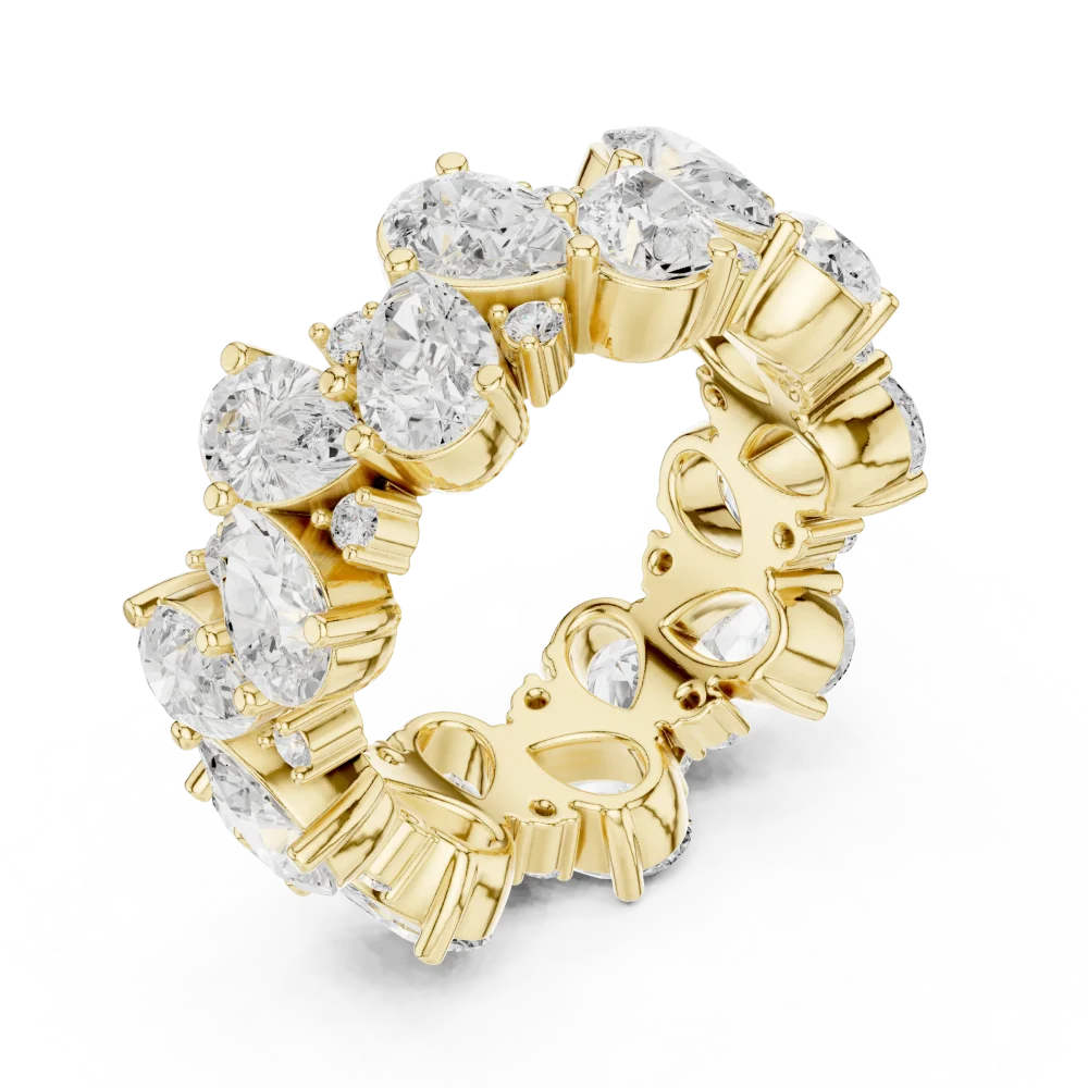 Experience brilliance with this hand-set pear and round DIAMEUR lab-grown diamond eternity band. Elevate your jewelry collection with sustainable luxury.