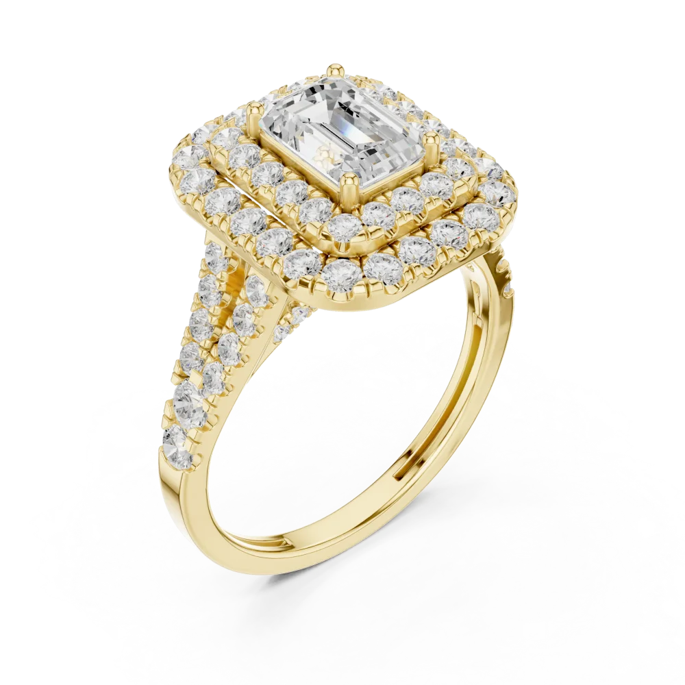 Celebrate your love with this architectural Emerald Solitaire ring. Featuring a brilliant DIAMEUR diamond and dual halos, shop this timeless masterpiece.