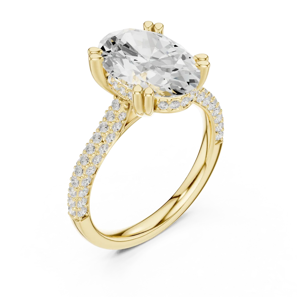 Celebrate forever with our Oval Cut Solitaire Ring. Featuring exquisite DIAMEUR diamonds and artisan pavé detailing, shop this modern bridal icon.