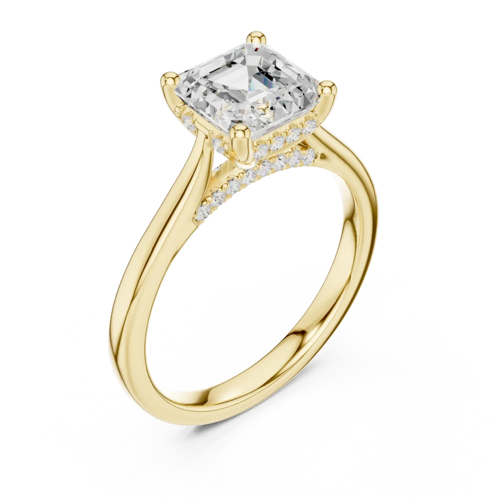 Experience timeless elegance with our emerald cut hidden halo solitaire ring. Featuring a brilliant DIAMEUR diamond, discover your perfect fit today.