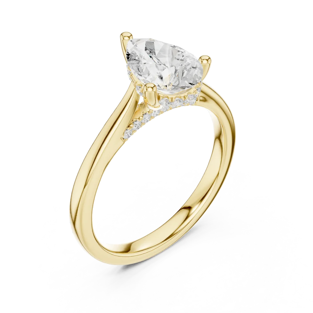 Discover the Ethereal Pear Solitaire Ring, featuring a brilliant DIAMEUR lab-grown diamond. Elevate your style with this modern luxury masterpiece.