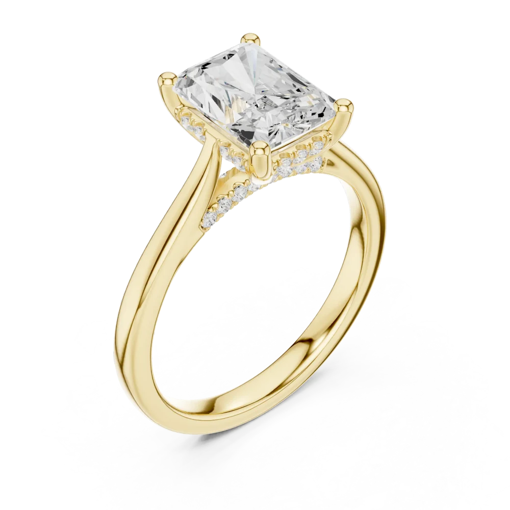 Discover the Ethereal Radiant Cut Solitaire Ring, a modern masterpiece featuring a brilliant center stone and delicate halo. Shop this luxury design.