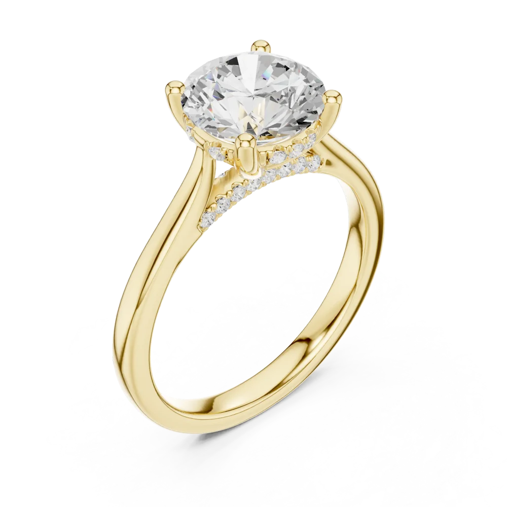 Experience timeless brilliance with our Round Pavé-Set Hidden Halo Solitaire Ring. Handcrafted with certified DIAMEUR diamonds. Shop the collection.
