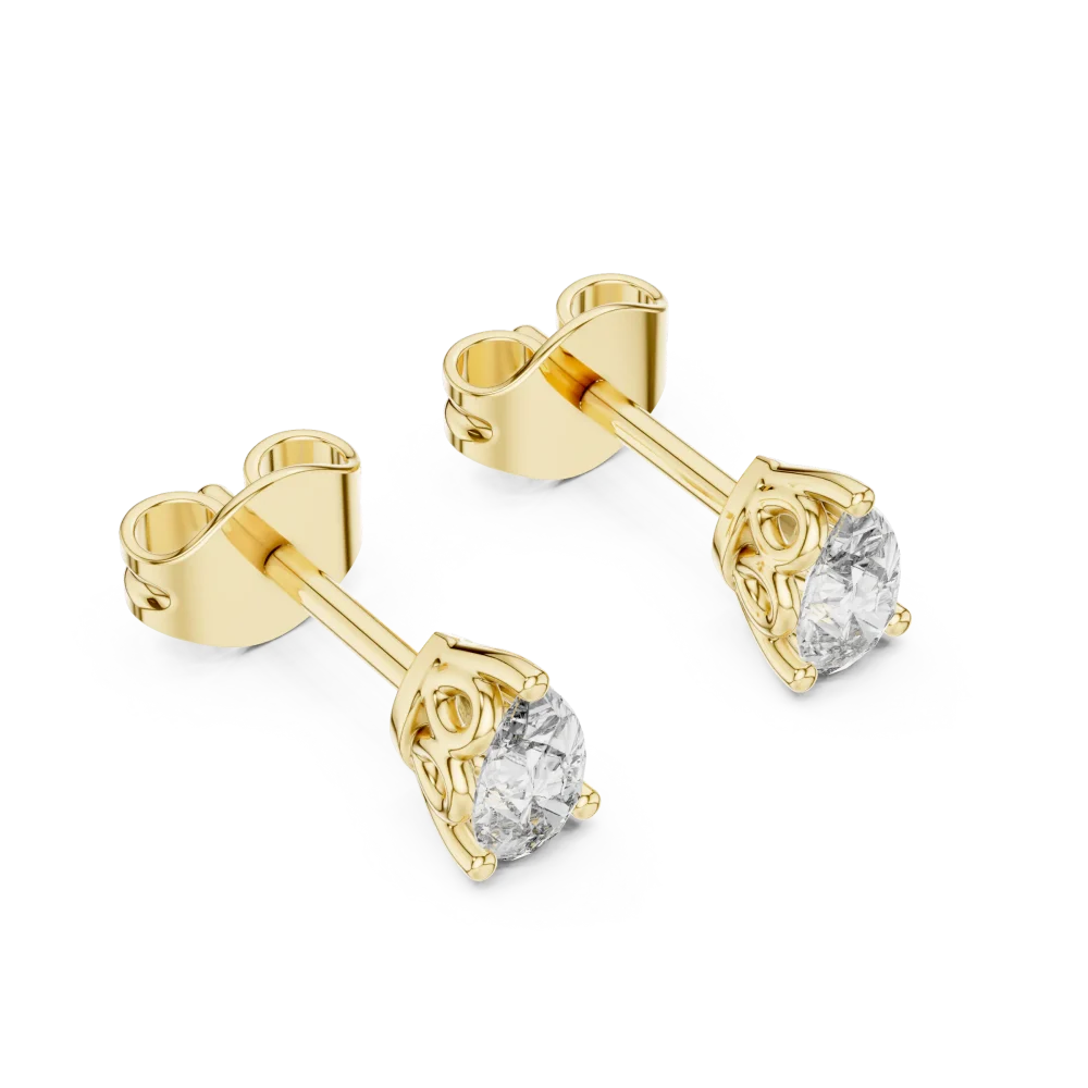 Elevate your style with these architectural pear-cut DIAMEUR diamond stud earrings. A masterclass in modern luxury and brilliant, sustainable shine.