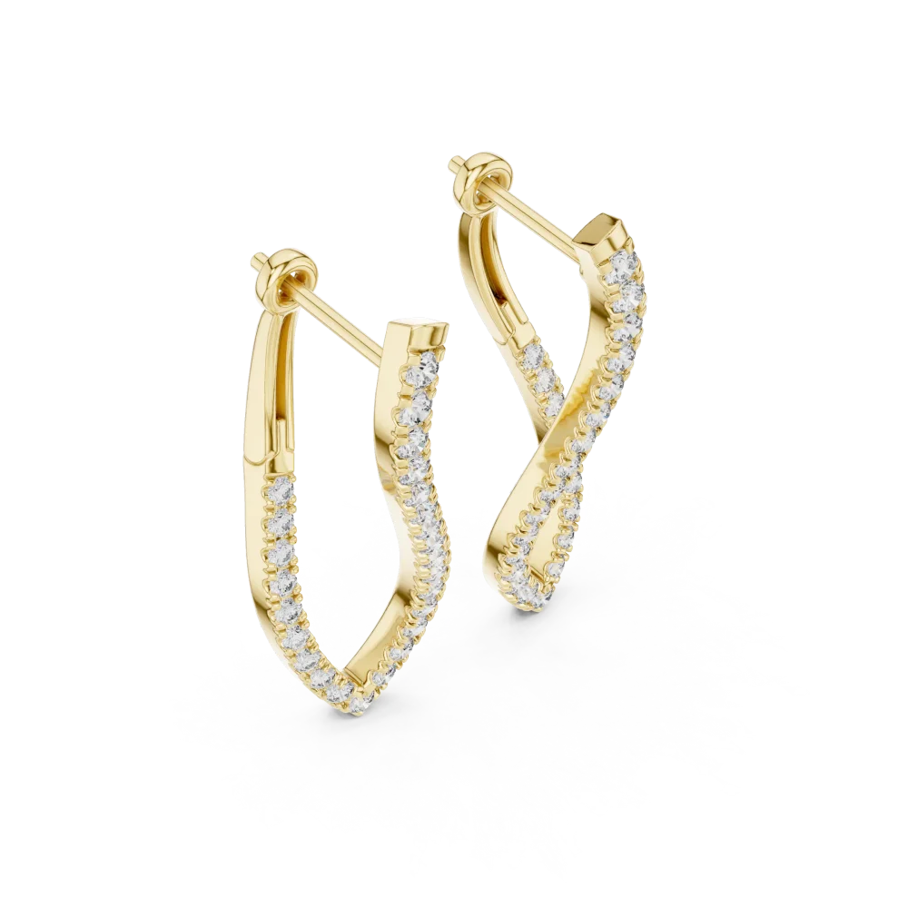 Adorn yourself with these fluid, pavé-set round brilliant drop earrings. Featuring DIAMEUR lab-grown diamonds, discover sustainable luxury today.