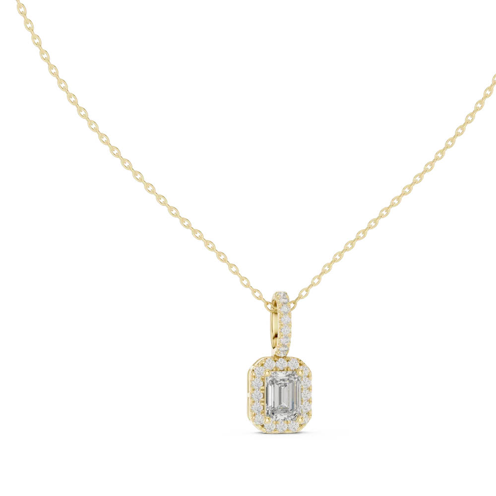 Discover the radiant elegance of our emerald-cut halo solitaire pendant. Crafted with premium DIAMEUR diamonds, it is the ultimate modern classic. Shop now!