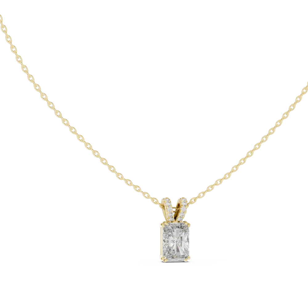 Discover the Luminary Radiant Solitaire Pendant, featuring a brilliant DIAMEUR diamond and hidden halo. Elevate your style—shop this modern classic.