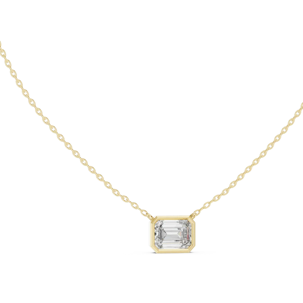 Discover the geometric allure of our emerald cut solitaire pendant. Handcrafted with a brilliant DIAMEUR diamond, it is the ultimate modern classic.