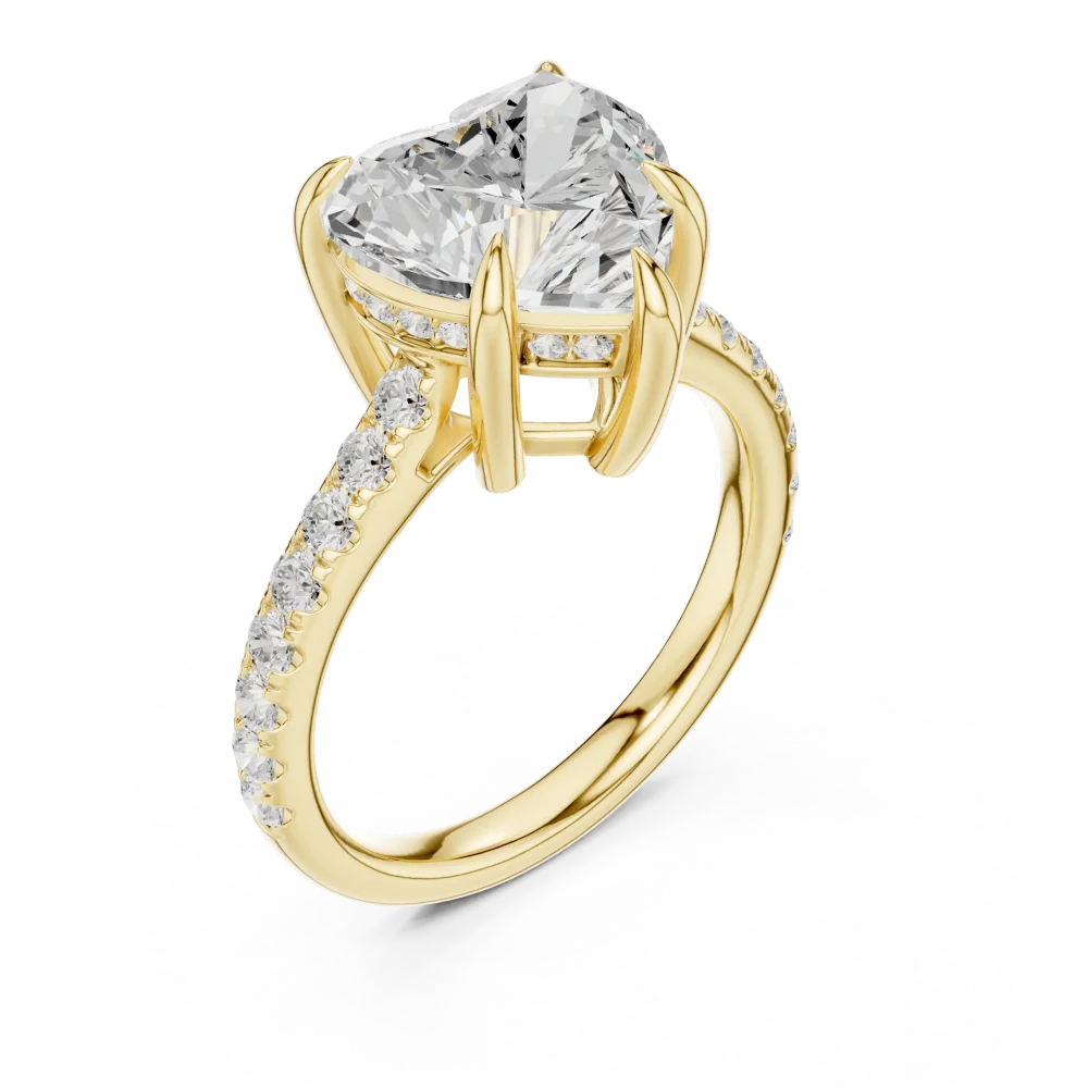 Experience romance with this Heart Solitaire ring, featuring brilliant-cut DIAMEUR diamonds and elegant pavé details. Shop this modern classic today.