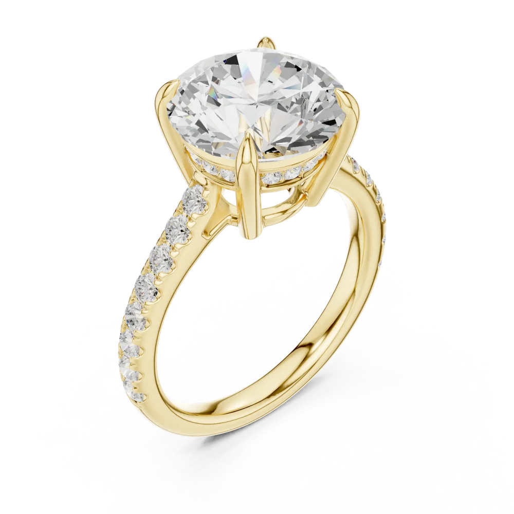 Discover the radiant allure of our pavé-set Solitaire Ring. Featuring a brilliant DIAMEUR center stone, it is the perfect blend of luxury. Shop today.