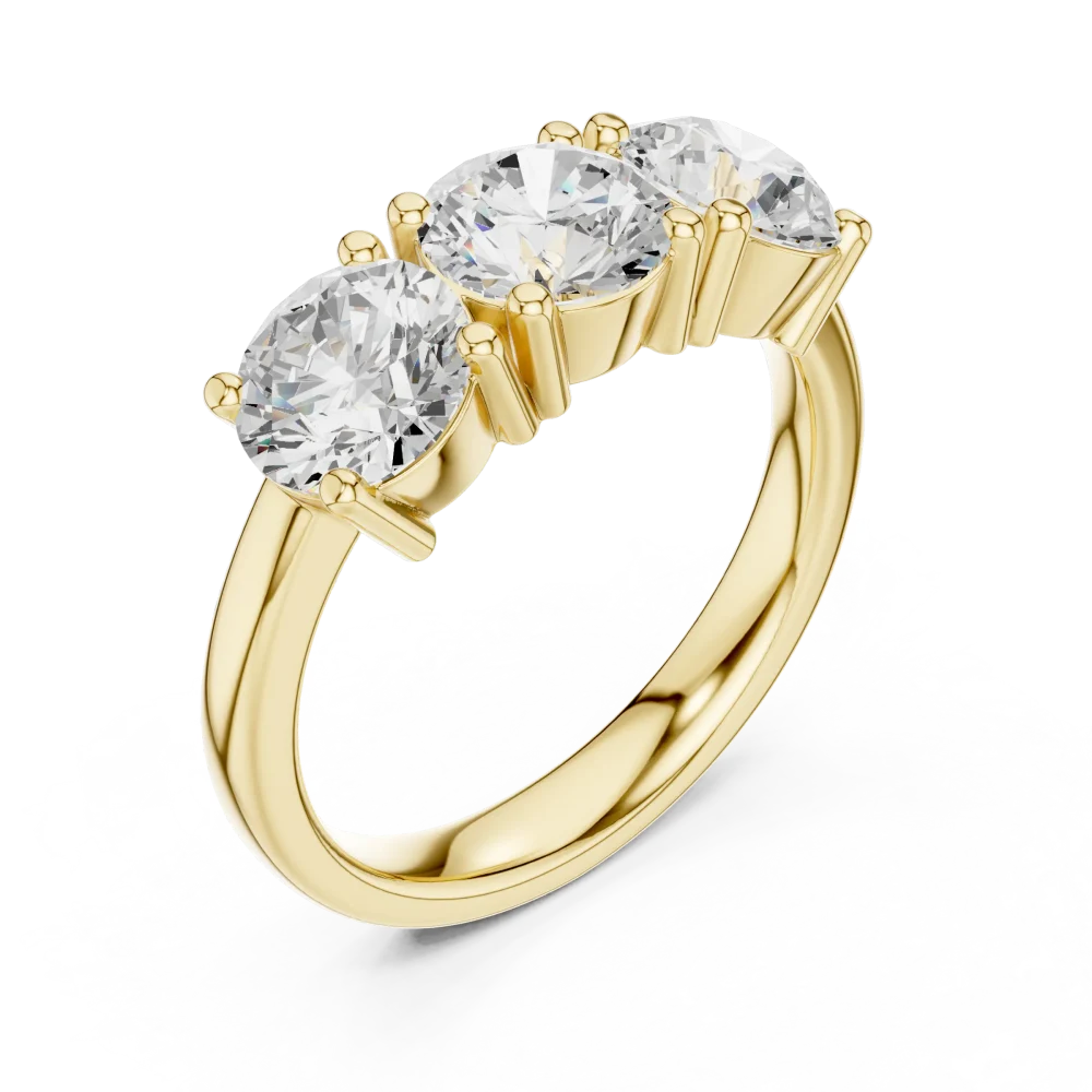 Discover the Luminary Three Stone Ring, featuring round brilliant DIAMEUR lab-grown diamonds. Elevate your style with this modern sustainable classic.