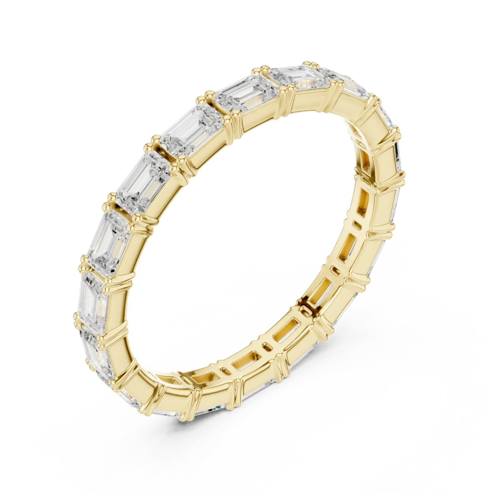 Experience the allure of our emerald-cut lab-grown diamond eternity band. A modern classic designed for effortless luxury—add this piece to your collection.