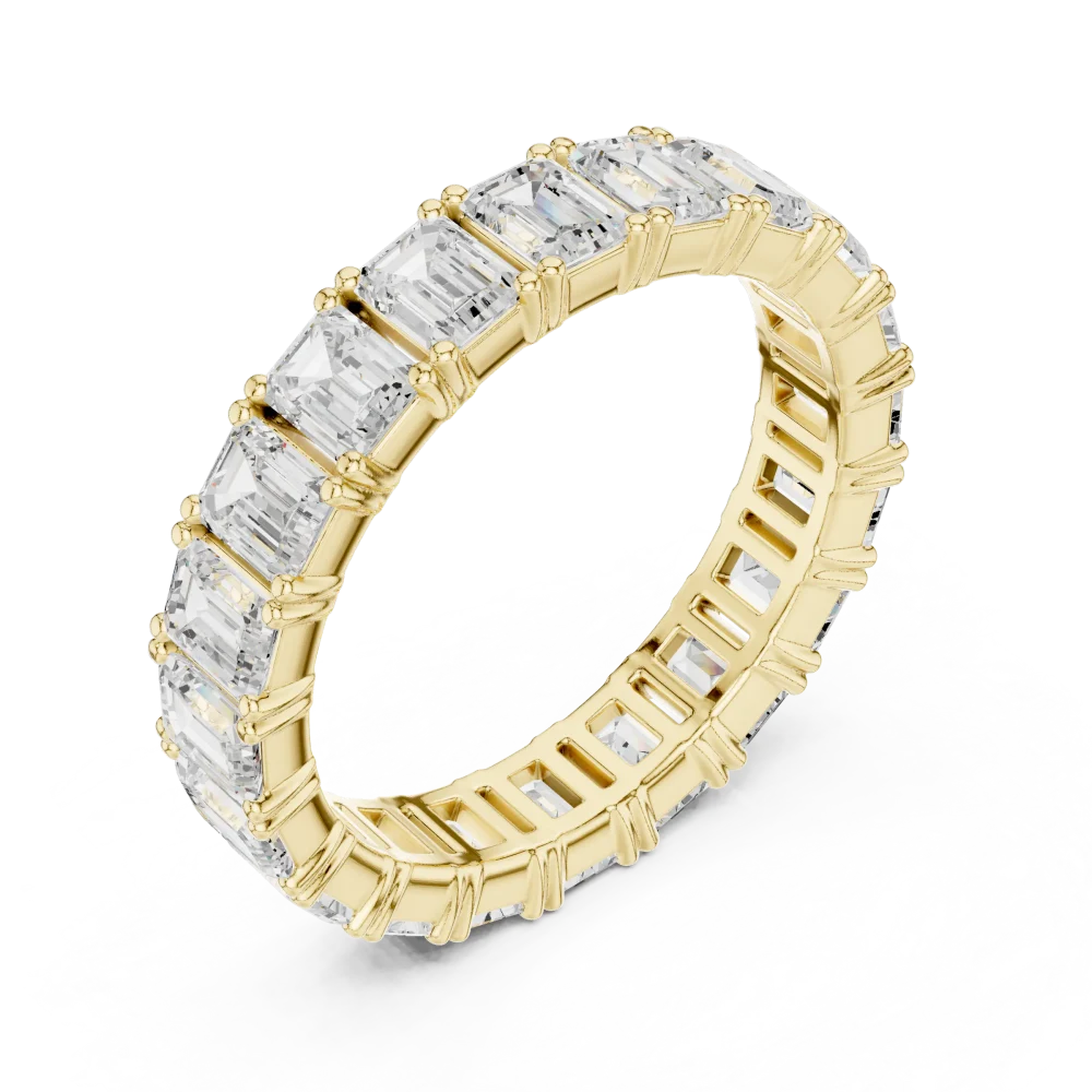 Adorn your hand with the geometric perfection of our Emerald Cut Eternity Band. Featuring brilliant DIAMEUR diamonds, discover timeless luxury today.