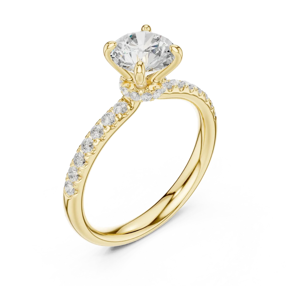 Discover the elegance of this Round Solitaire Engagement Ring. Featuring a brilliant DIAMEUR diamond and pavé band, it is the perfect modern classic.