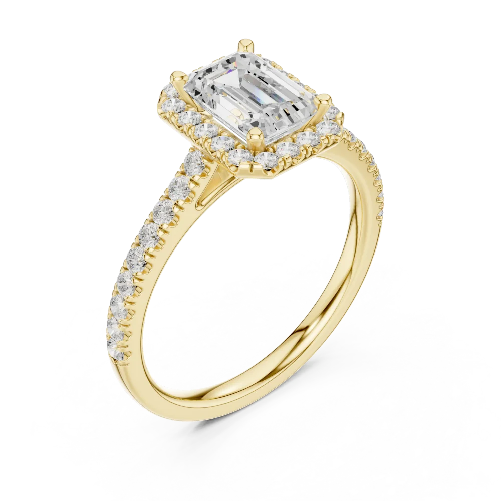 Experience the timeless sophistication of our halo diamond ring, featuring an emerald-cut DIAMEUR diamond. Elevate your collection and shop today.