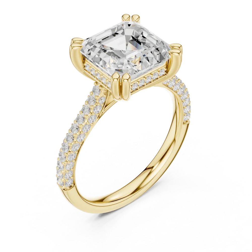 Elevate your love with this architectural Emerald Cut Solitaire ring, featuring brilliant pavé accents. Experience the luxury of ethical DIAMEUR diamonds.